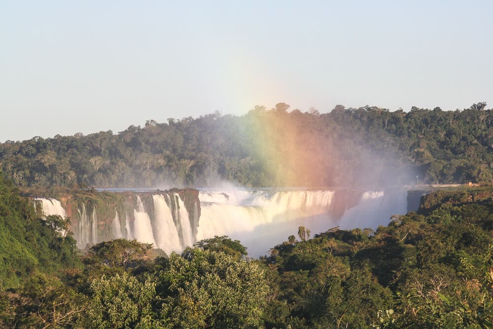 A rainbow in the mist over a waterfall