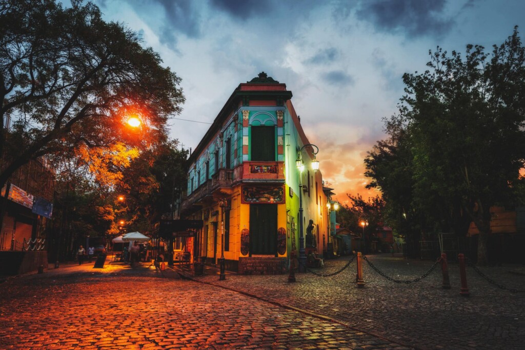 A colorful building after dark