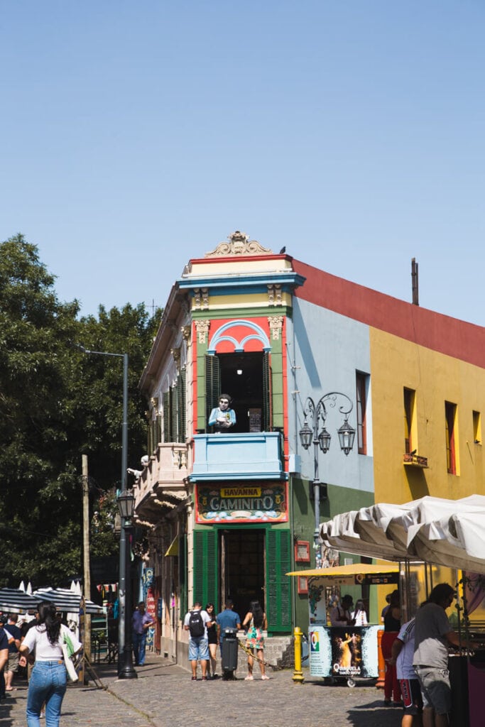 A colorful street corner and an outdoor market