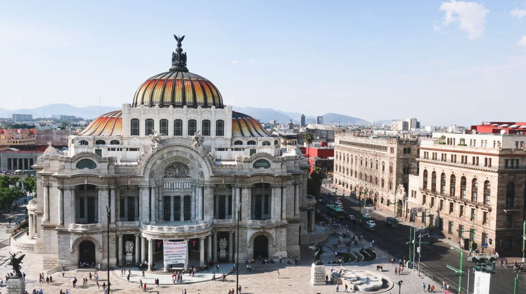 A large opera house seen from above in downtown Mexico City