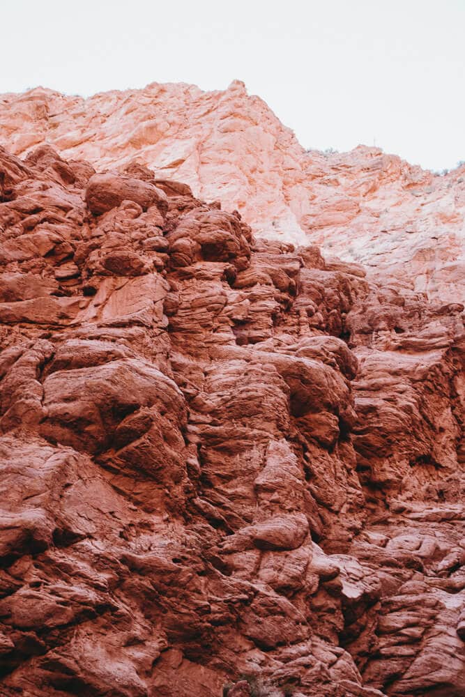 Red stone formations at Cuevas de Acsibi in Salta