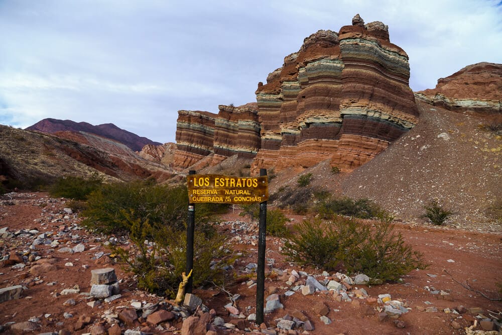 Layers of colored stone on a rock formation in the desert