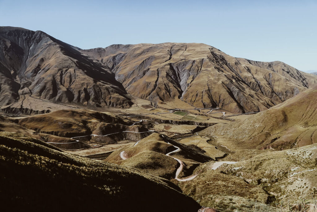 A highway weaves through the mountains