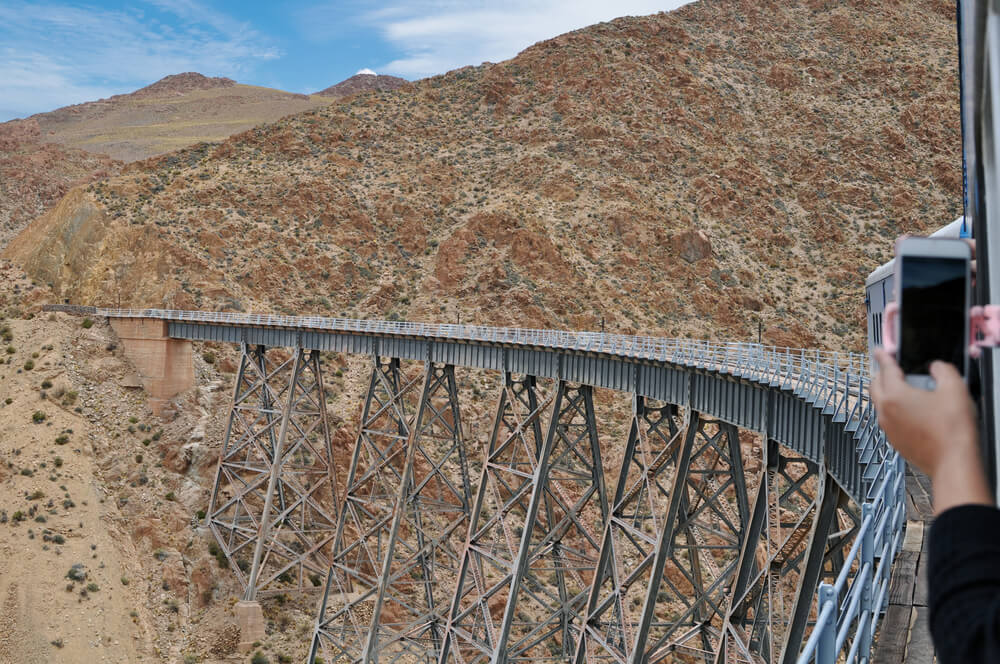 A bridge over a desert canyon