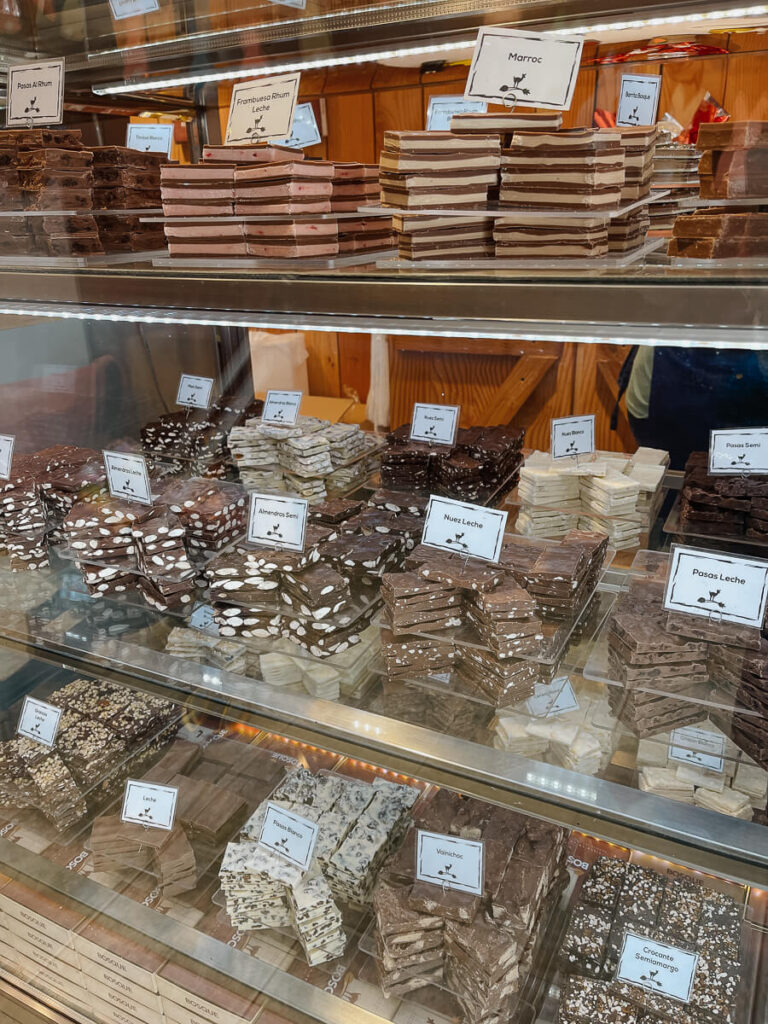 Trays of chocolate for sale in a modern shop